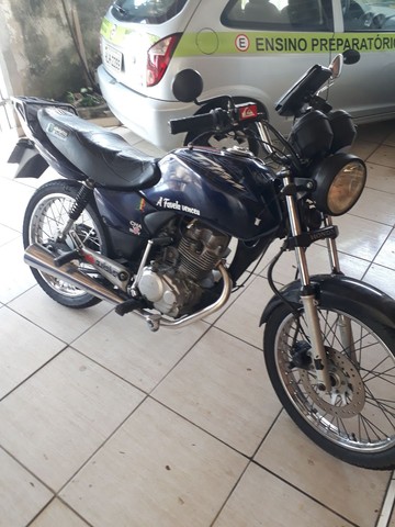 TITAN 125