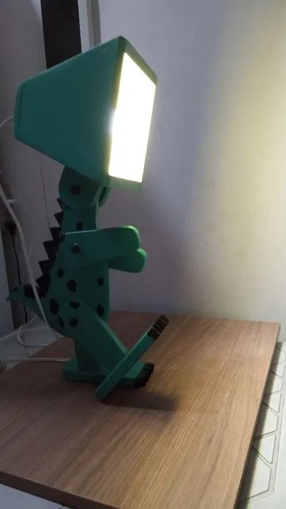 Abajur decorativo em forma Dinossauro  - Iluminação Criativa.