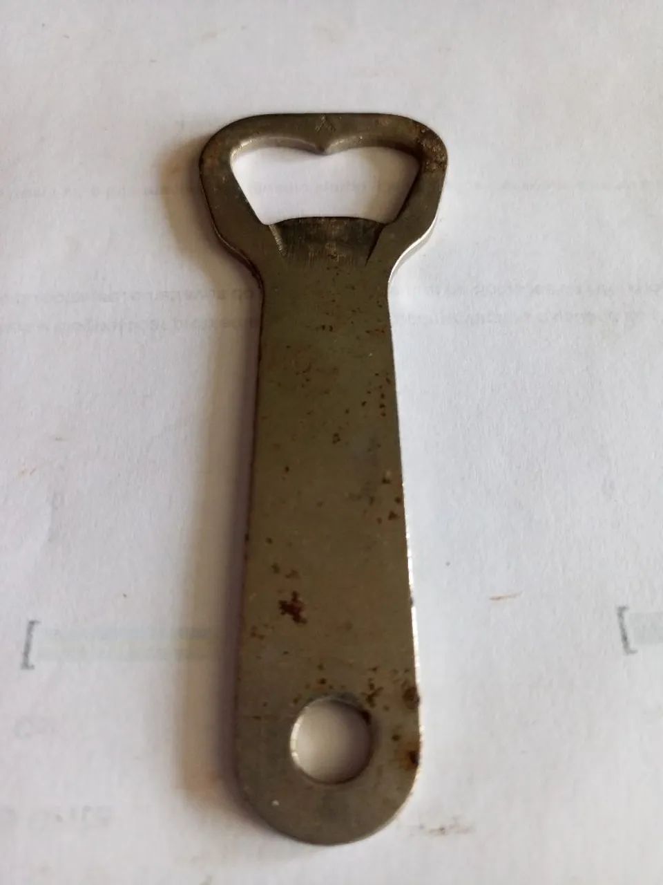 Abridor de garrafa em metal antigo 