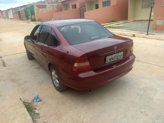 Vendo ou troco por carro um 1.0 que sejam flex - Foto 6
