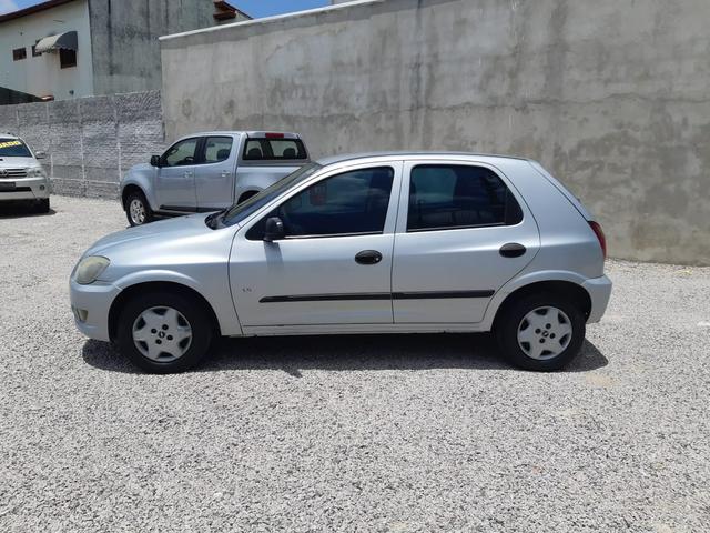 Celta LS 1.0 flex, completo, 04 portas, pneus novos - Foto 5