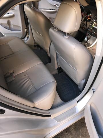 Toyota Corolla xei 13/14 Carro em excelente estado - Foto 16