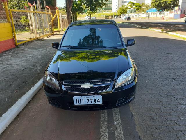 Vendo celta lt 1.0 4 Portas com air bag ABS completo super inteiro - Foto 3