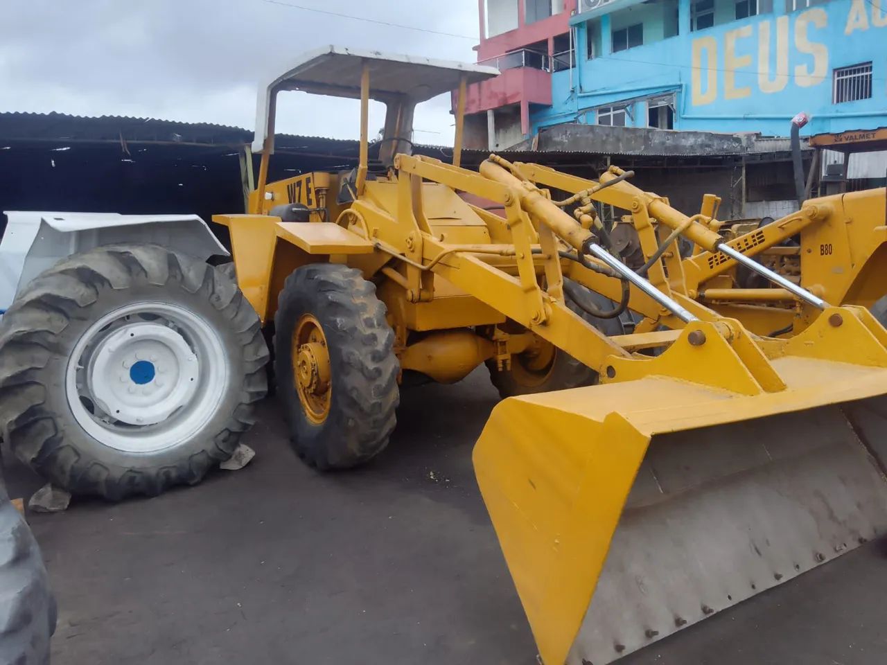 Pá carregadeira enchedeira