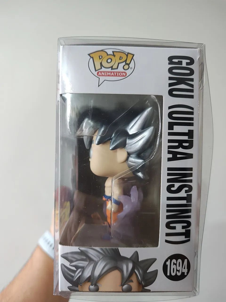 Funko Pop! Goku Ultra Instinct - Hot Topic Exclusive Glow in The Dark + Protetor Incluso  - Foto 2