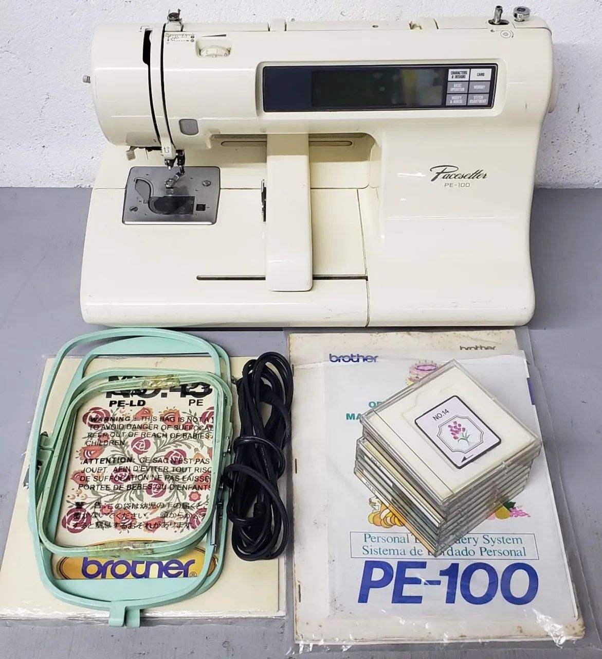 Maquina de bordar brother pe100 defeito ler 