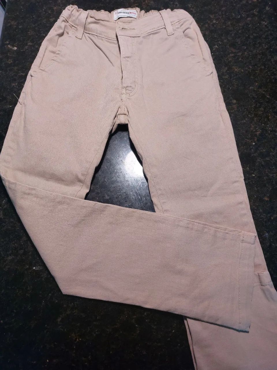 Calça de brim bege