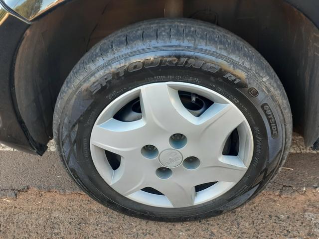 Vendo celta lt 1.0 4 Portas com air bag ABS completo super inteiro - Foto 6