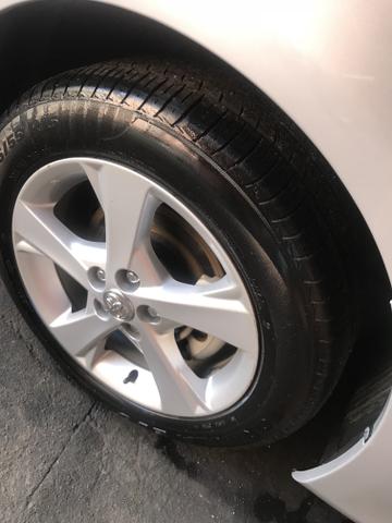 Toyota Corolla xei 13/14 Carro em excelente estado - Foto 6