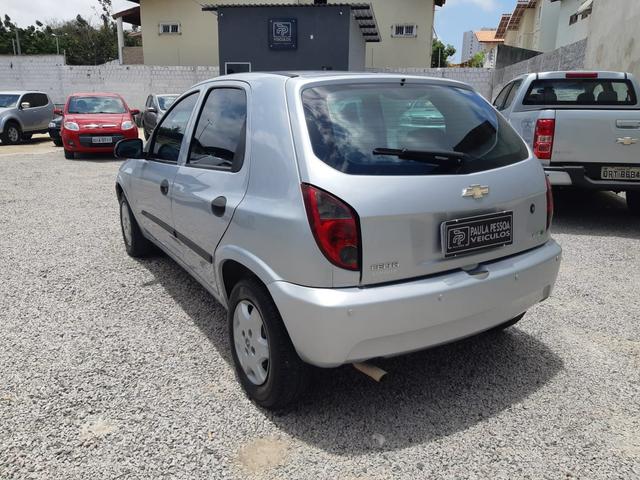 Celta LS 1.0 flex, completo, 04 portas, pneus novos - Foto 4