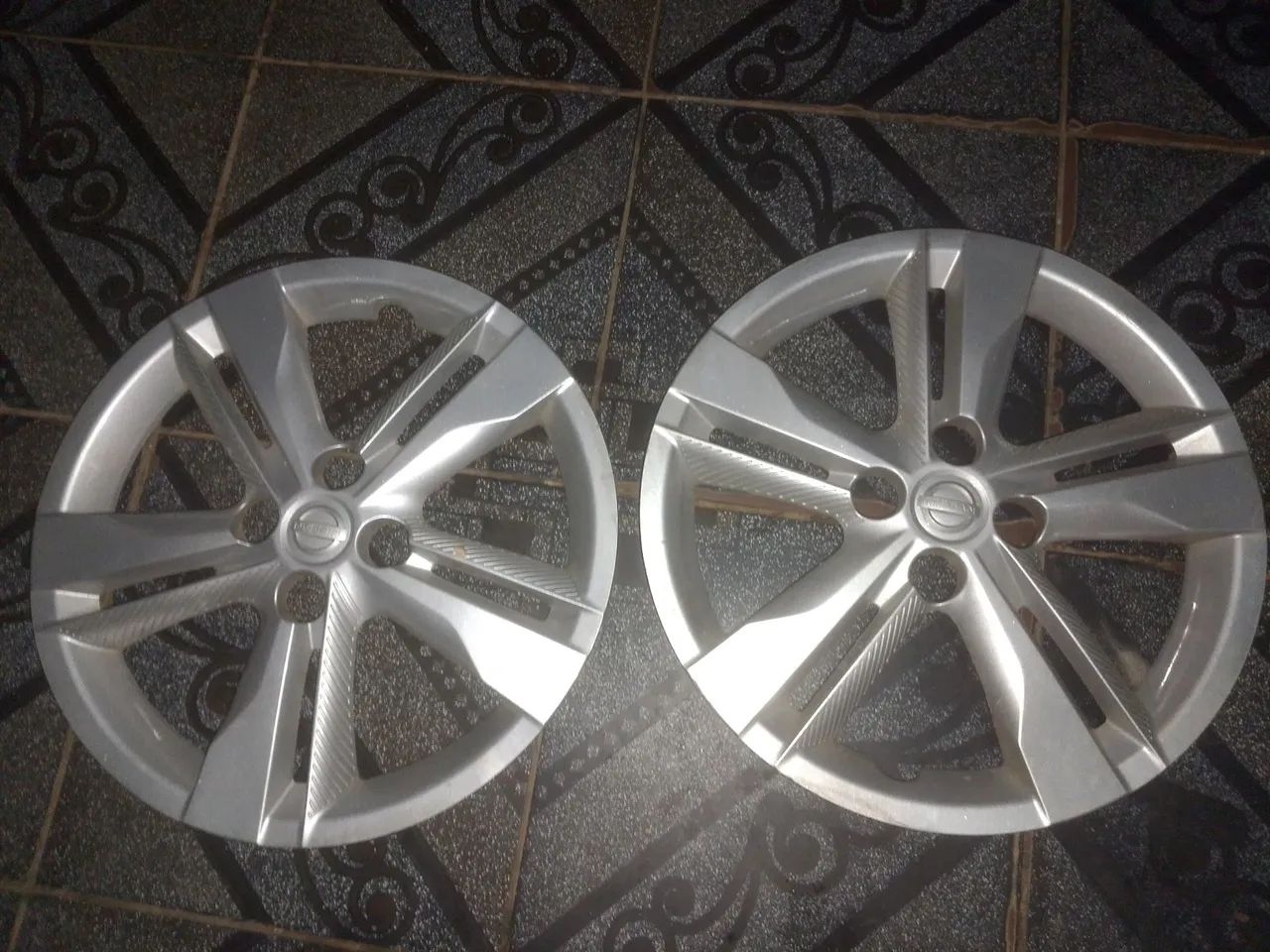 Calotas Nissan Aro 16
