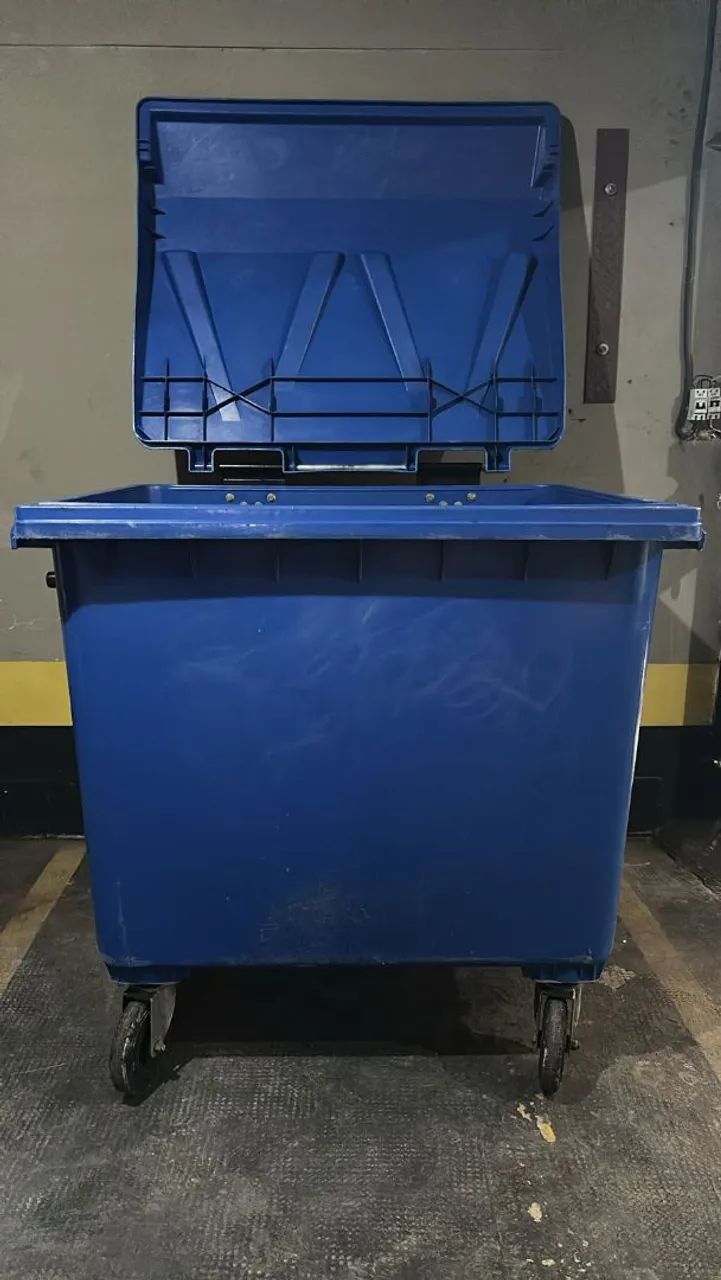 Used and new trash bins