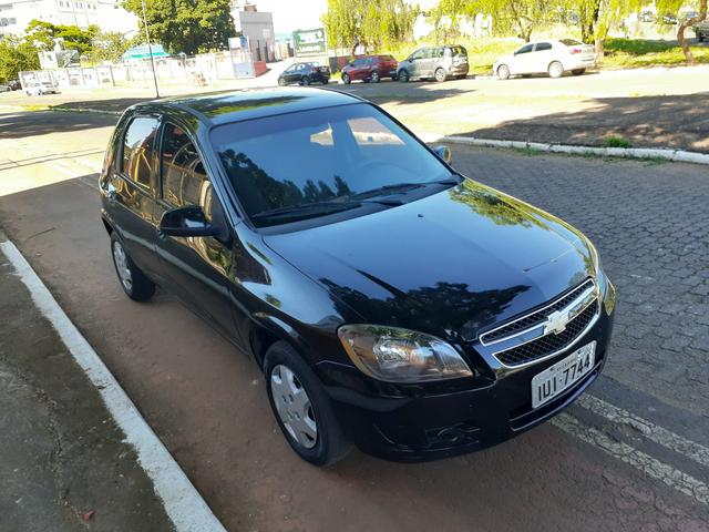 Vendo celta lt 1.0 4 Portas com air bag ABS completo super inteiro