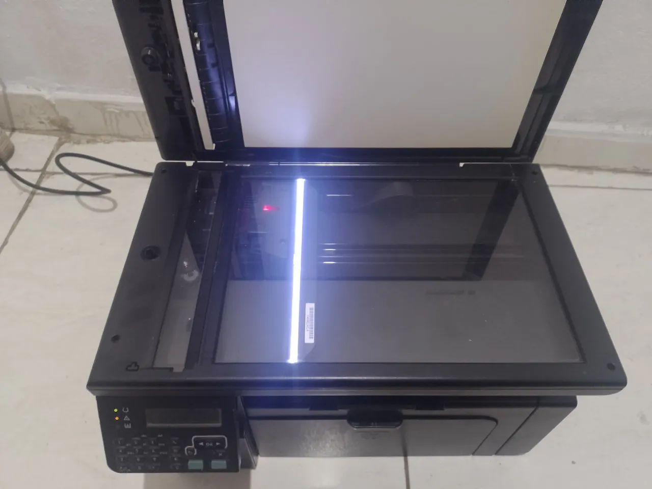 Impressora Multifuncional HP LaserJet M1212nf - Funcionando, com defeitos