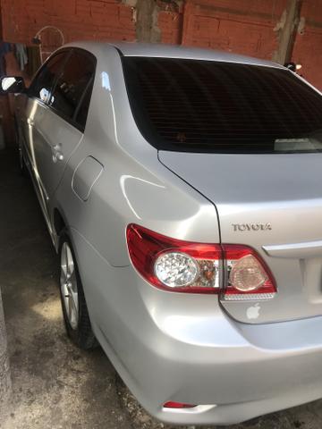 Toyota Corolla xei 13/14 Carro em excelente estado - Foto 3