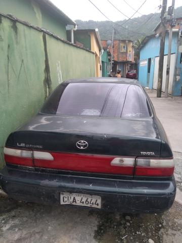 Vendo ou troco. um corola 96 com u motor travado fauta de Óleo - Foto 2