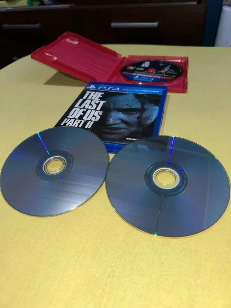 The last of us 1 remaster + the last of us part 2 seminovos ps4 - Foto 5