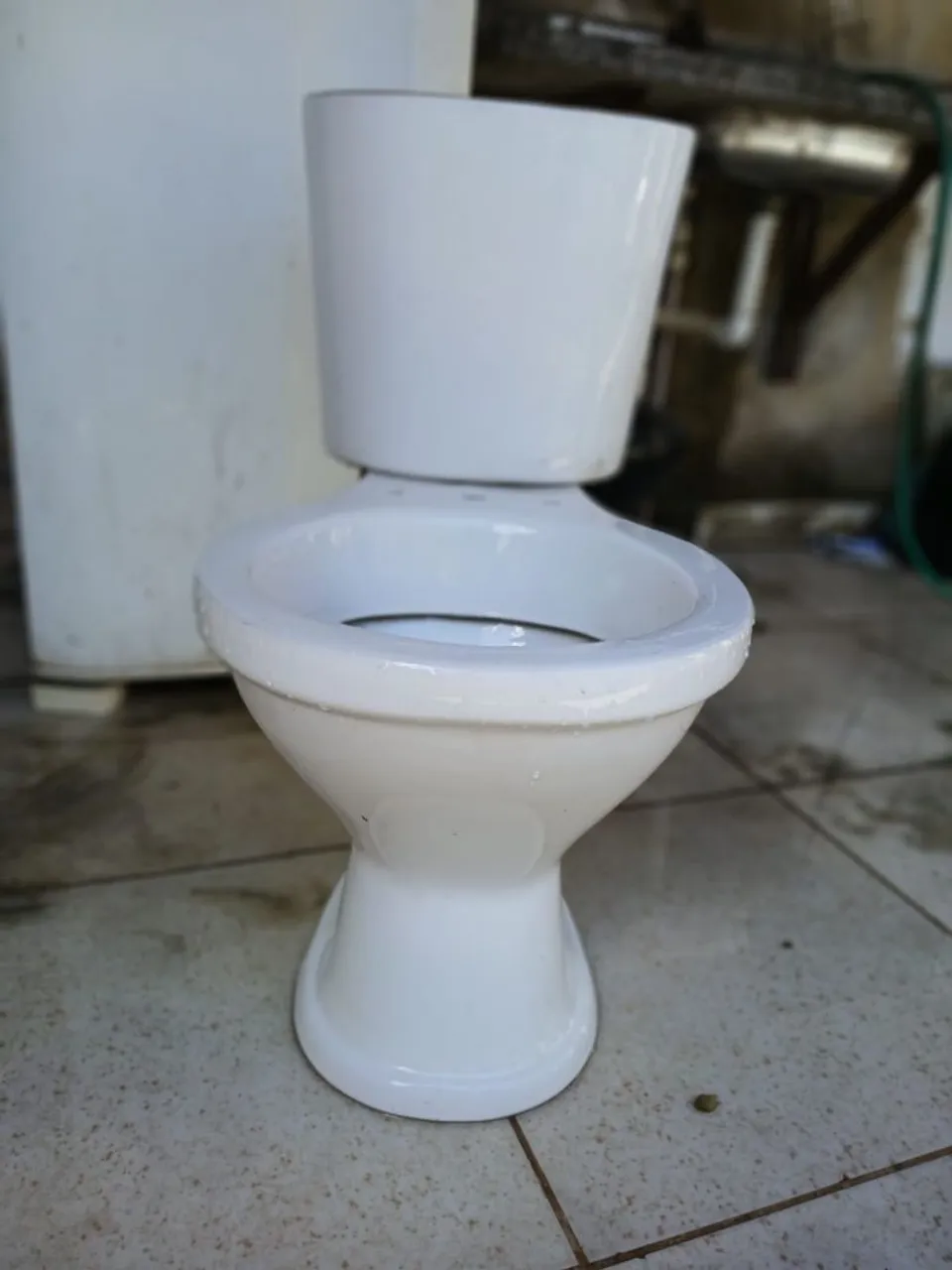 Vaso Sanitário,semi novo,só a descarga está quebrada