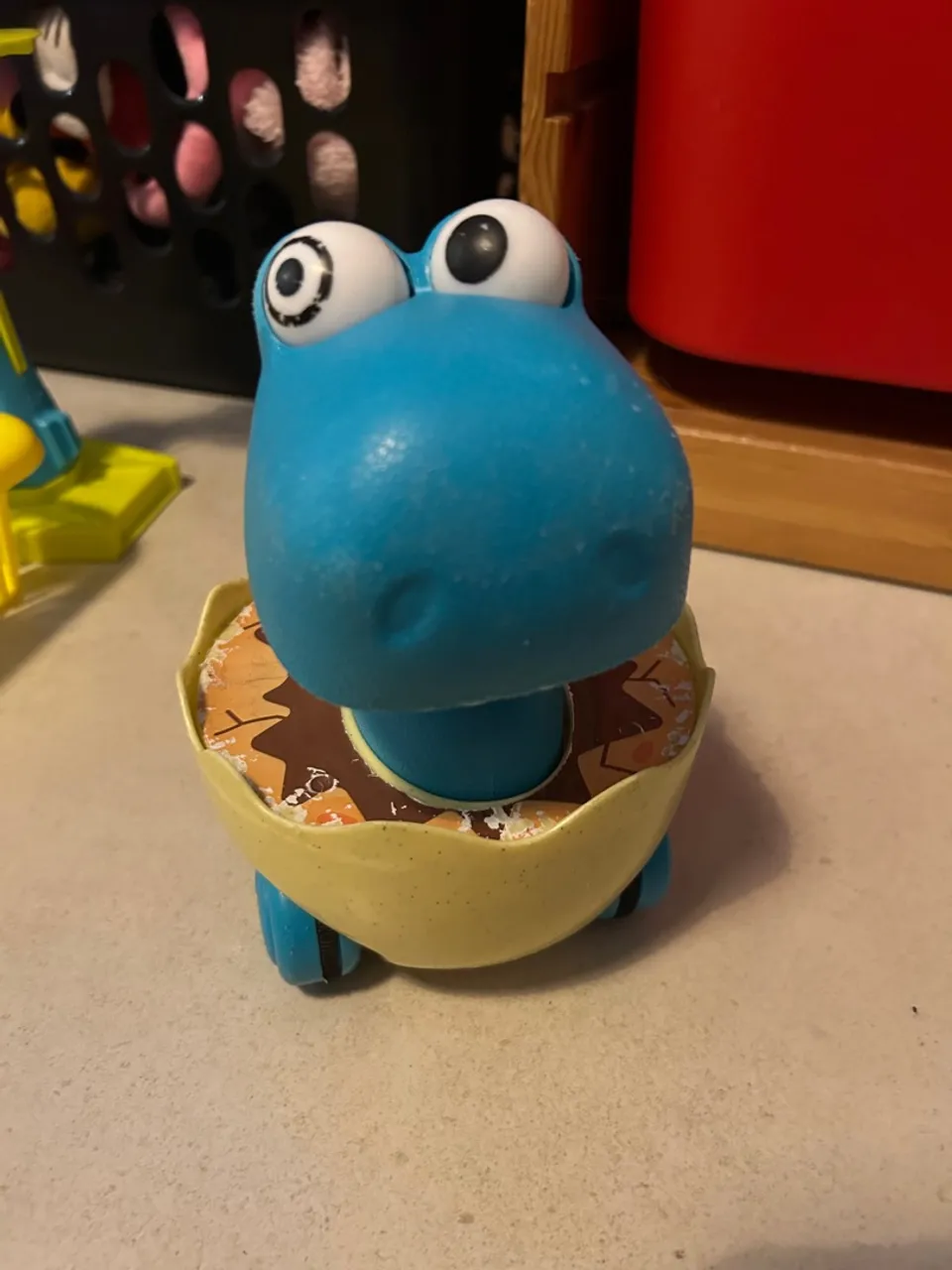 Carrinho de dinossauro