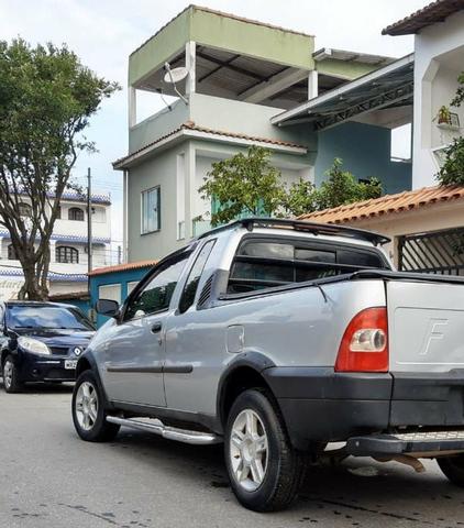 Strada, GNV e banco traseiro