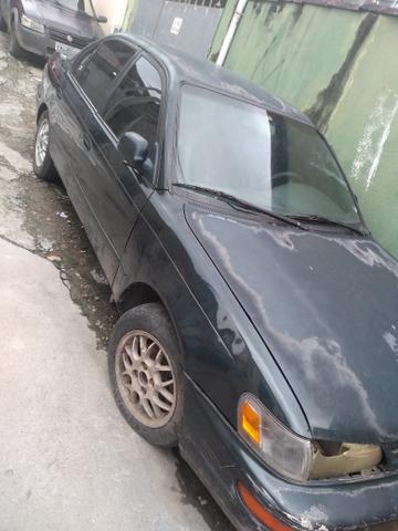 Vendo ou troco. um corola 96 com u motor travado fauta de Óleo - Foto 4