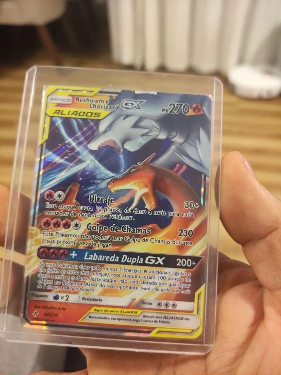 Reshiram e Charizard-GX 20/214