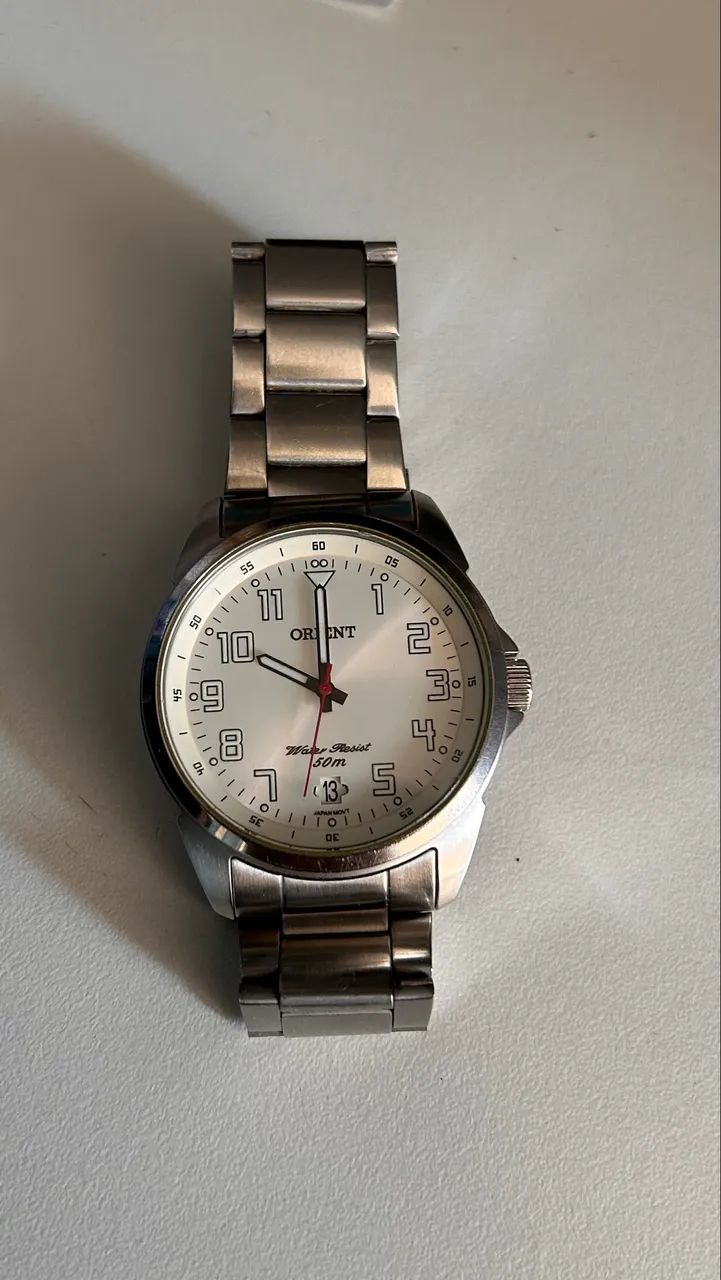 Relógio Orient quarts, pulseira metal 