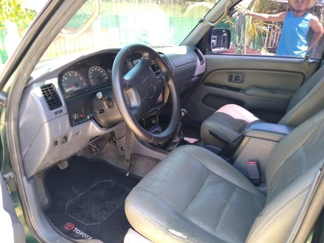 Toyota HIlux SW4 4x4 7 lugares Turbo Diesel - Foto 9