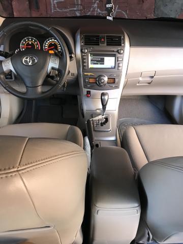 Toyota Corolla xei 13/14 Carro em excelente estado - Foto 20