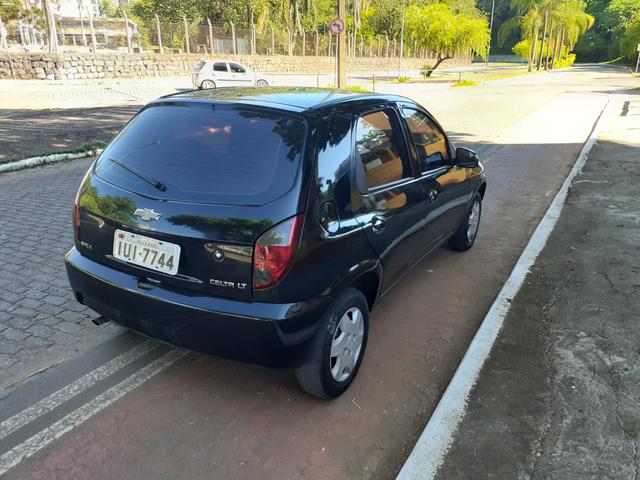 Vendo celta lt 1.0 4 Portas com air bag ABS completo super inteiro - Foto 5