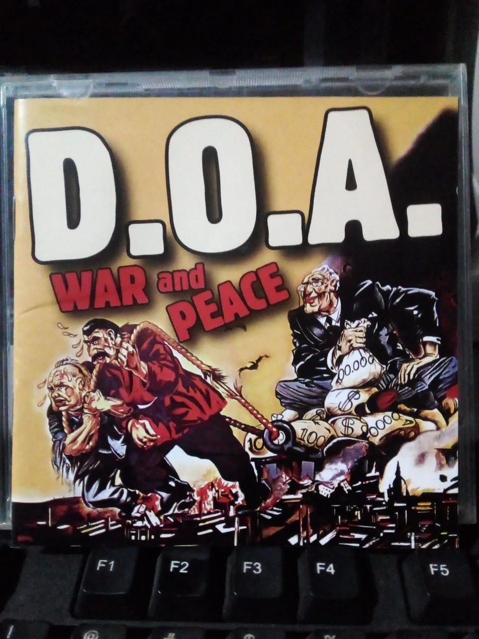 CD D.O.A. - War and Peace