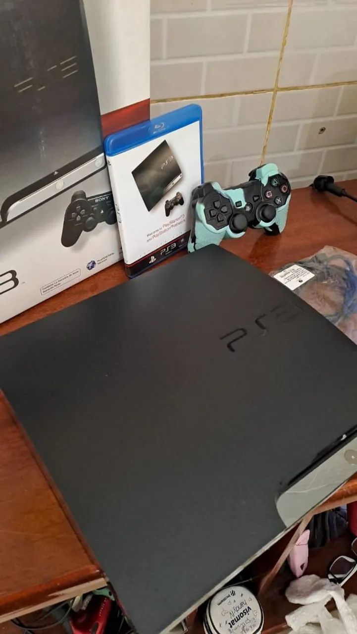 Ps3 Slim na caixa