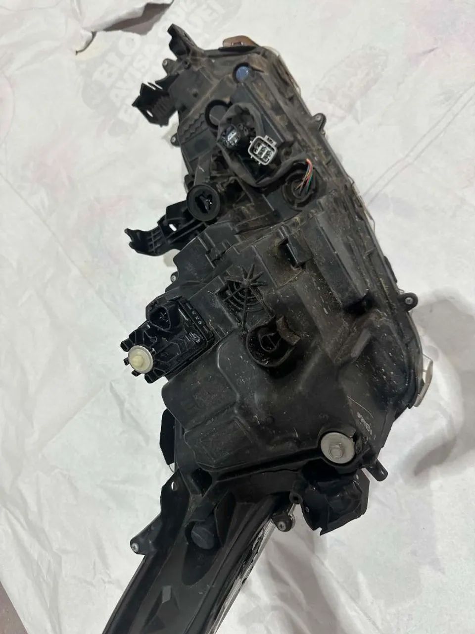 Farol Corolla lado esquerdo 
