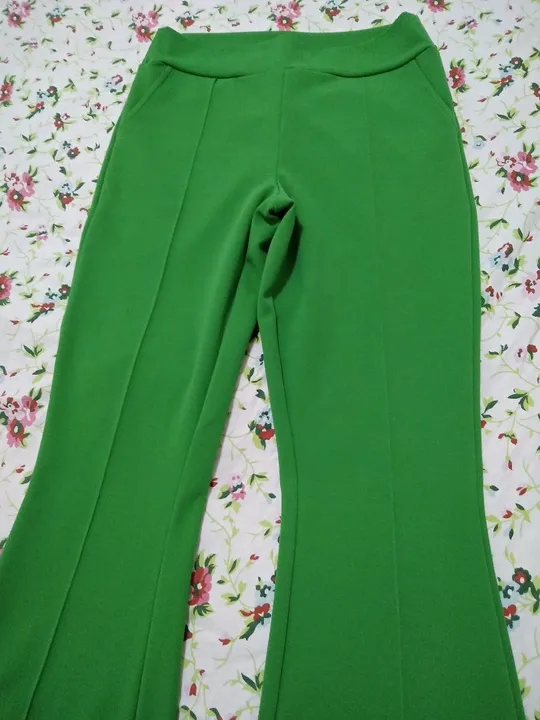 Calça em malha Tam M