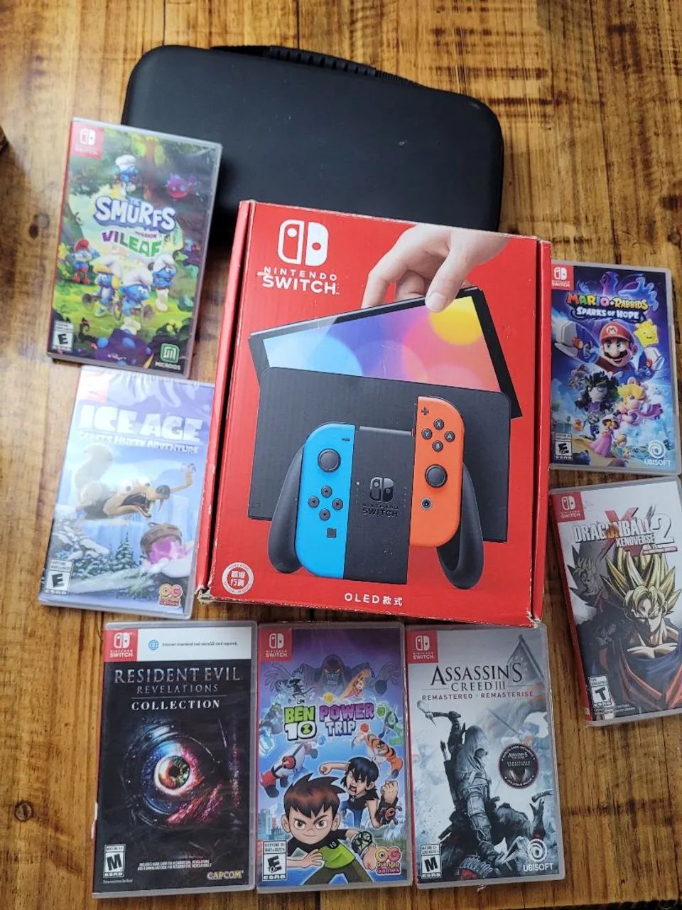 Nintendo Switch Oled Com 7 jogos Físicos - Consoles de Vídeo Game