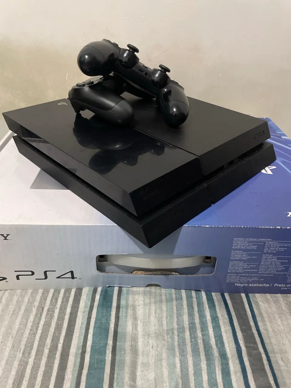 Ps4 fat com pasta térmica trocada e limpeza interna na caixa!