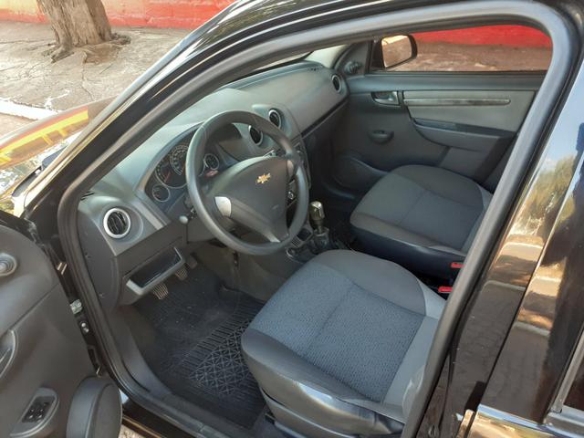 Vendo celta lt 1.0 4 Portas com air bag ABS completo super inteiro - Foto 7