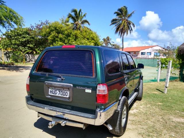Toyota HIlux SW4 4x4 7 lugares Turbo Diesel - Foto 13