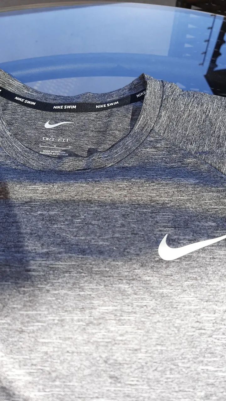 Camiseta Nike Dri-FIT Swim Masculina - Foto 3