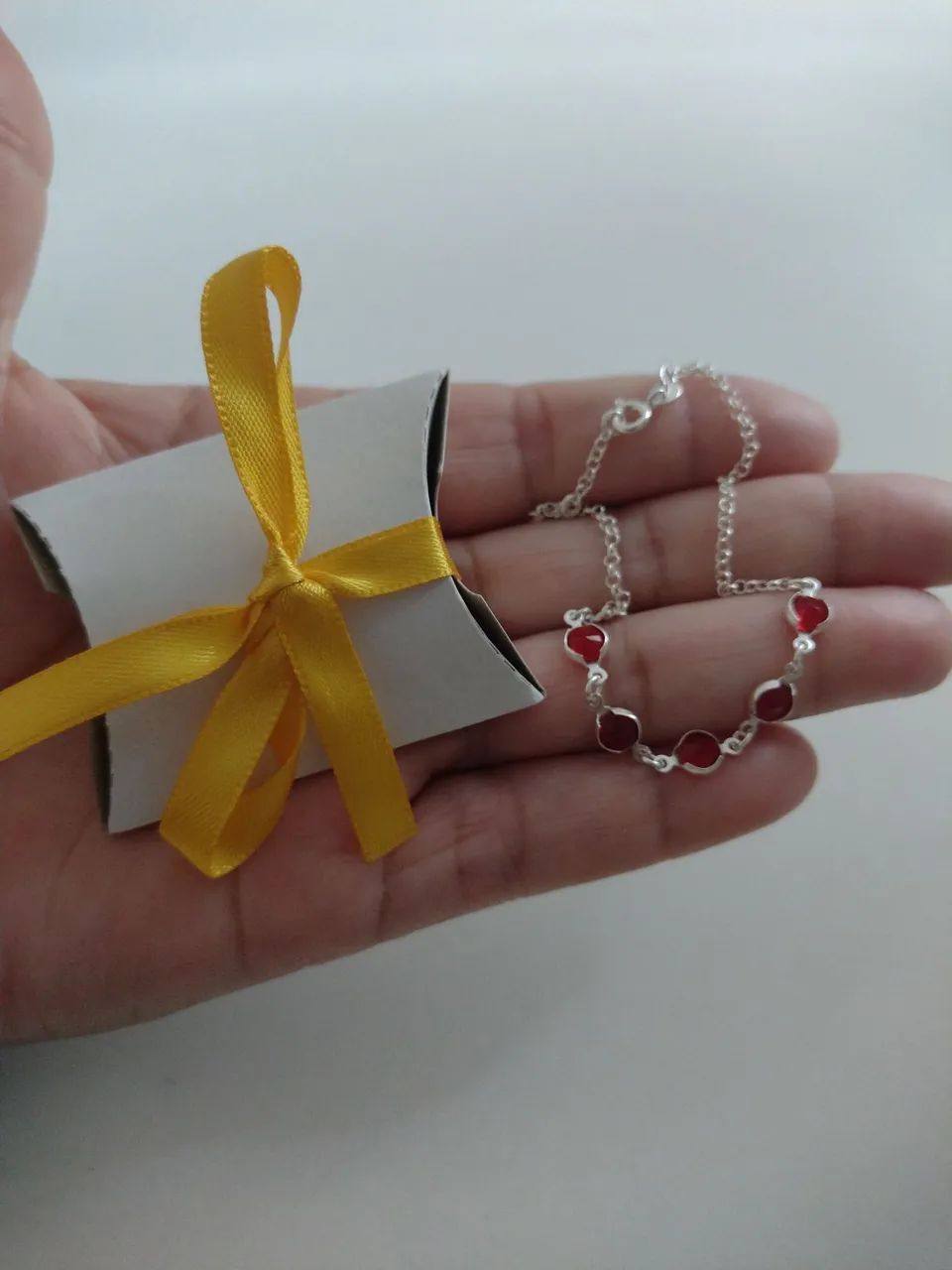 Pulseira prata 925 pegada lindaa para uso ou presente.