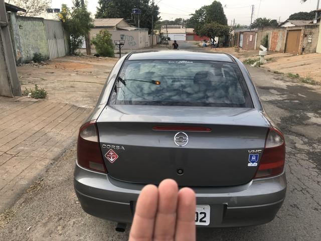 Corsa Sedan Joy 1.0 pego troca - Foto 6