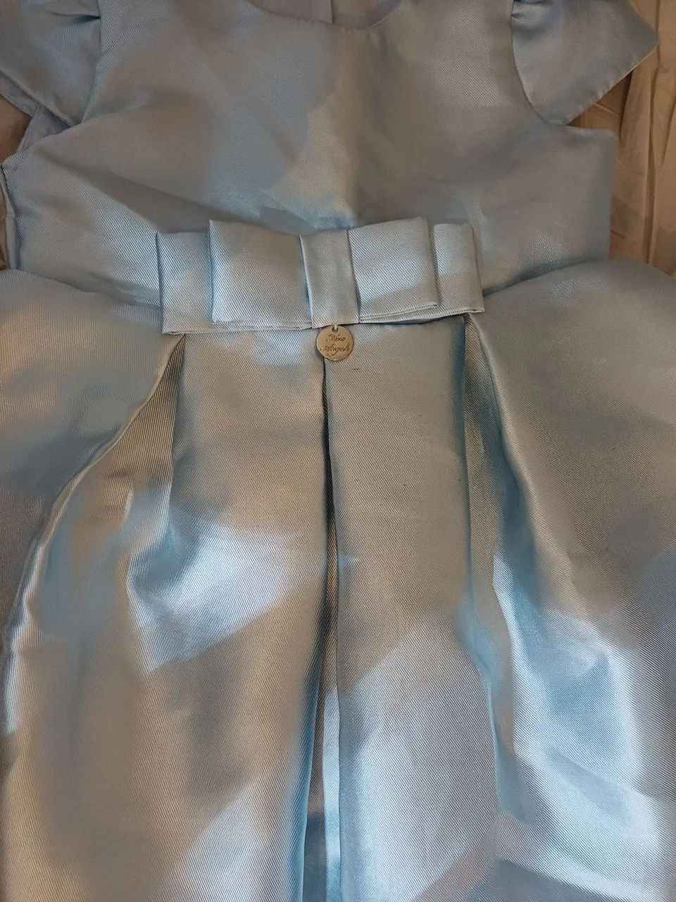 Vestido de festa infantil azul turquesa claro liso, com forro e detalhes em laço.  - Foto 5