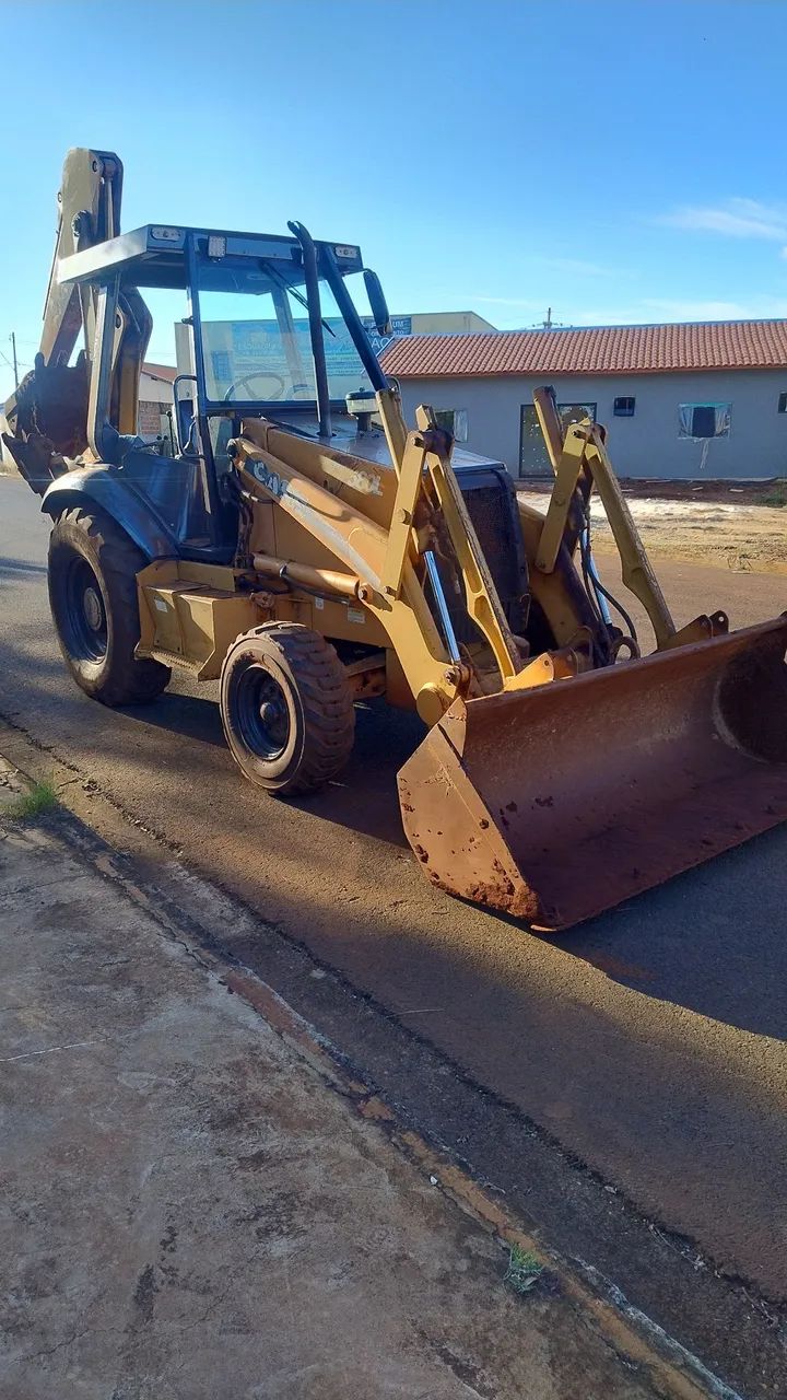 Retroescavadeira 580L - Foto 4