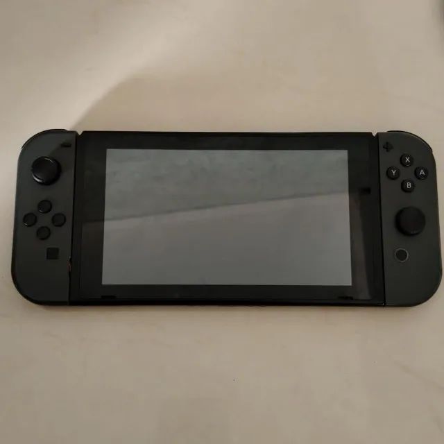 Nintendo Switch V2 Praticamente Novo Completo com Acessórios e Jogos - Foto 2