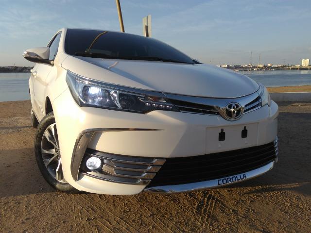 Vendo ou troco em carro de valor ate 30 mil,este corolla gli 2018 com acessorios do xei - Foto 11