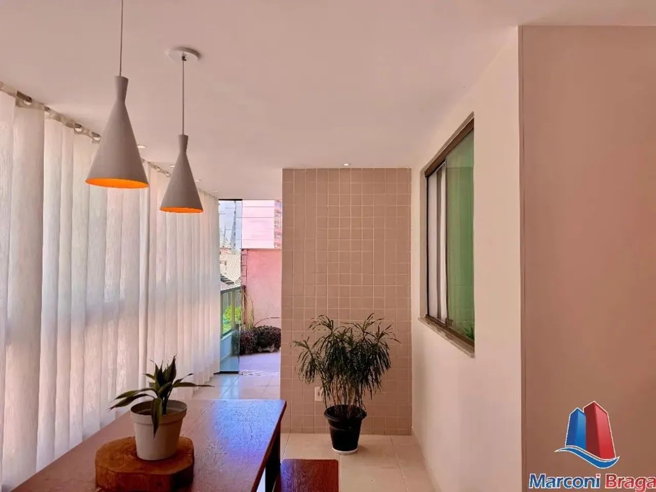 Apartamento à venda em Guarapari-ES, na Praia do Morro, com 3 quartos, 1 suíte e 100m² de  - Foto 4