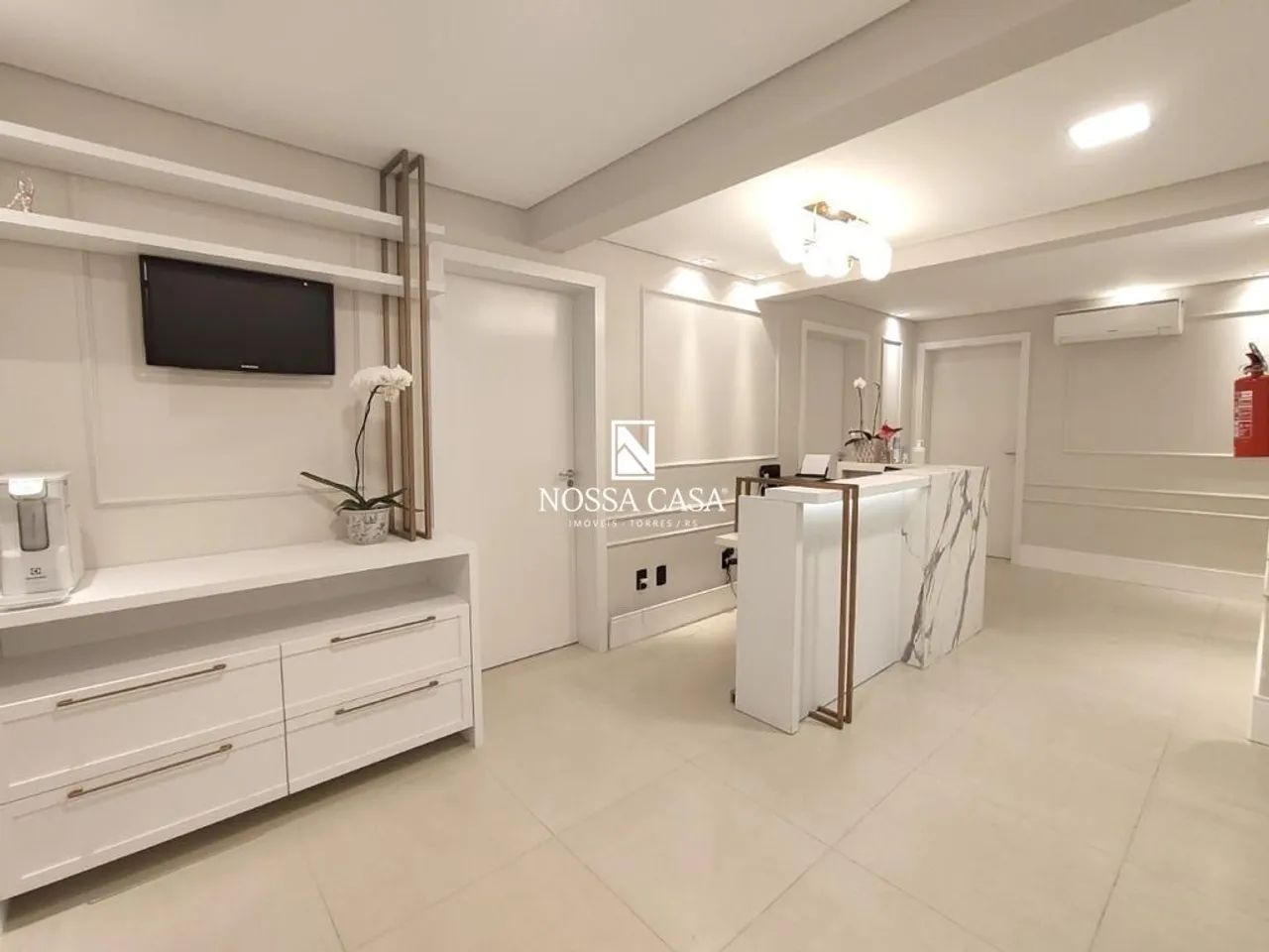 Sala comercial com 02 ambientes no Centro de Torres/RS