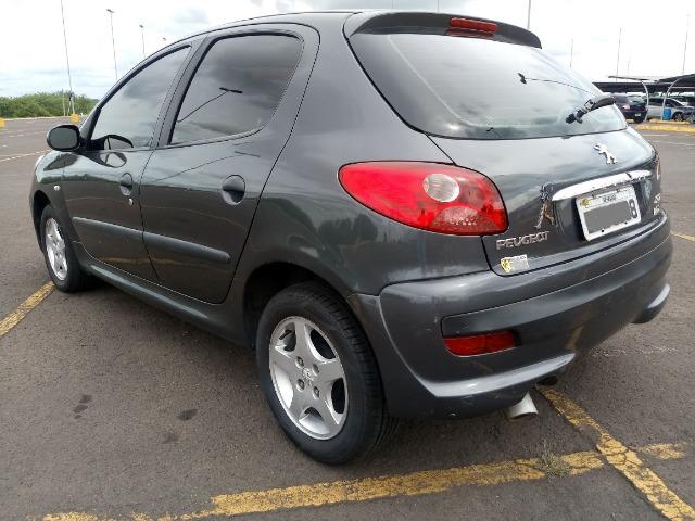 Peugeot 207 1.4 8v Flex 4 portas, Direção Hidraulica e Vidros Eletricos baixa Km - Foto 5