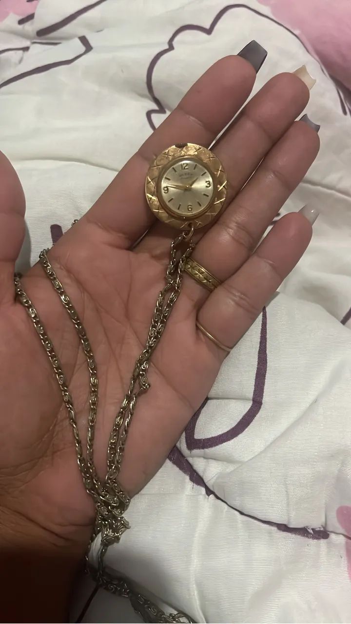 Relógio de bolso, não sei o nome exato 