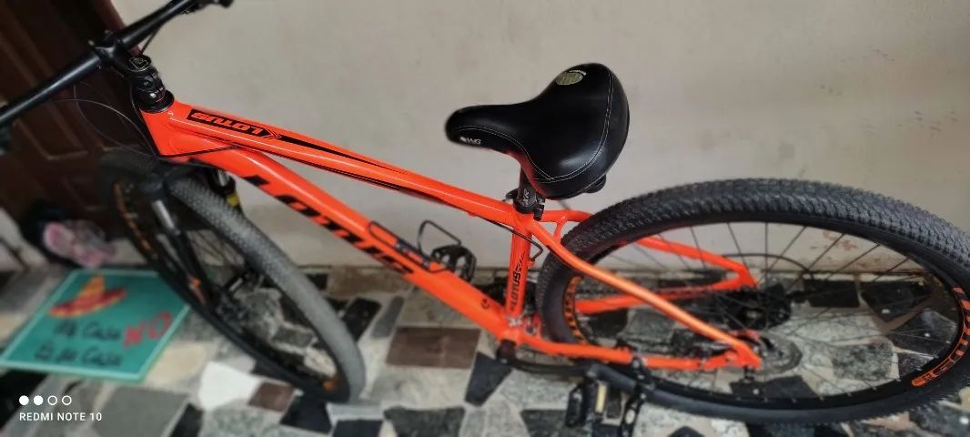 BIKE CAIRU LOTUS ARO 29, 21 MARCHAS, FREIO A DISCO, QUADRO 17.5, LARANJA/PRETO (COM NOTA) - Foto 3